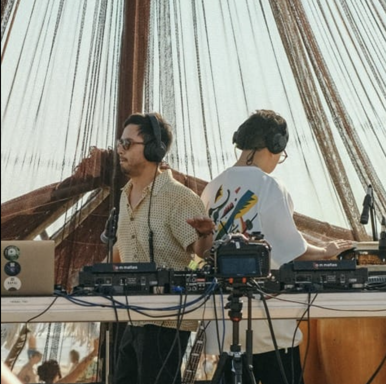 avi and wattusi on a boat